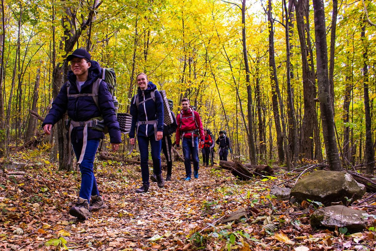 hiking students during the fall
