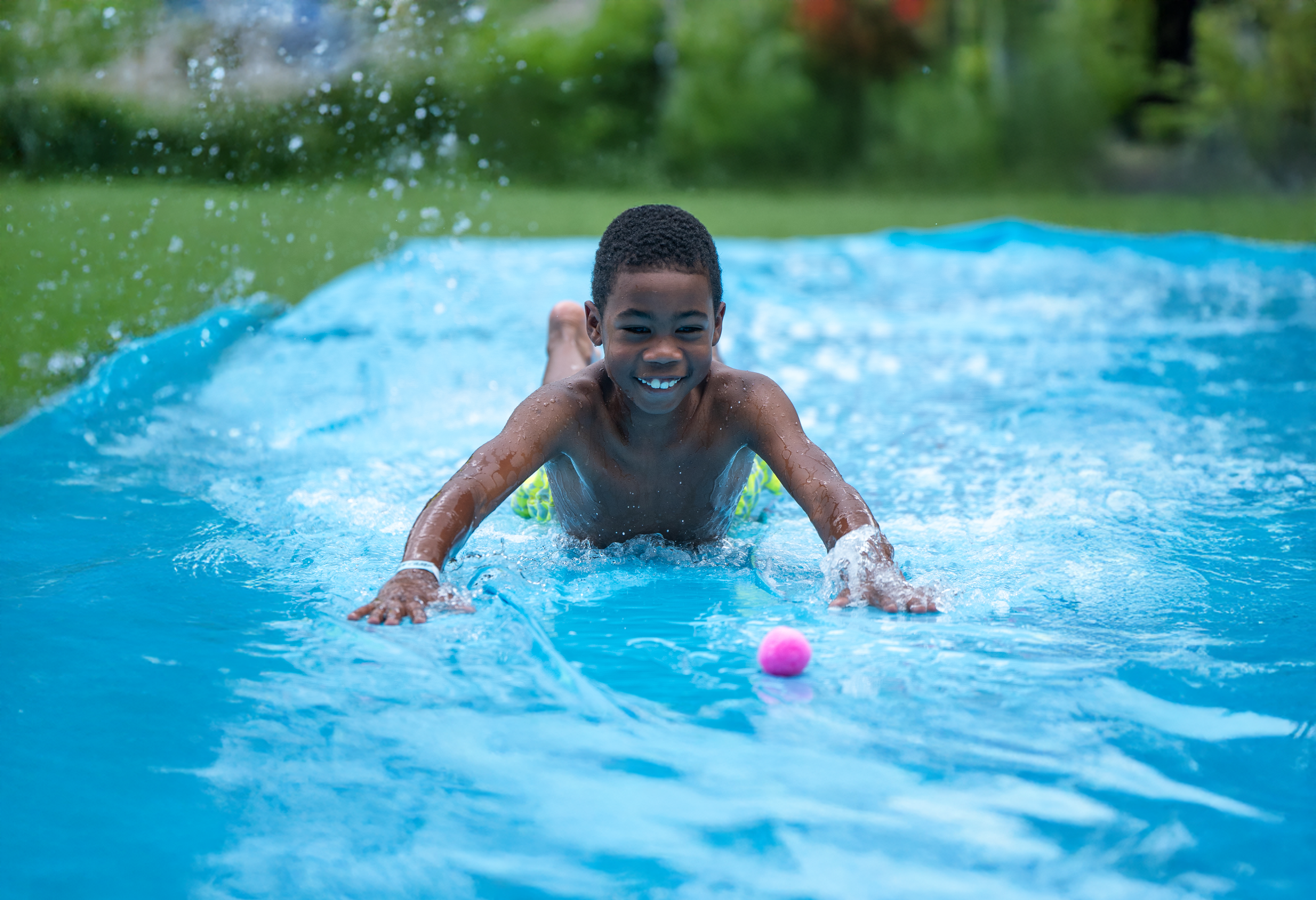 slip and slide little boy